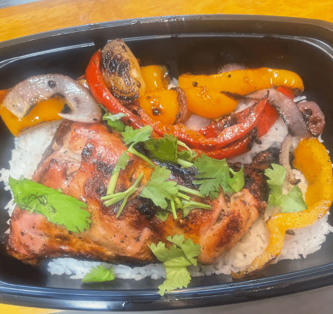 Freshly prepared royal biryani dish with herbs and spices
